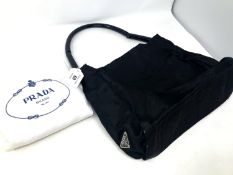 Prada : Lady's black nylon hand bag, with makers plaque to side,