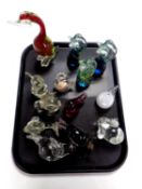 A tray containing assorted glass animal ornaments and paperweights to include Mdina glassware
