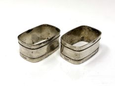 A pair of silver napkin rings.