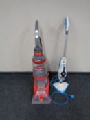 A Vax Dual V carpet cleaner together with a Vax steam mop