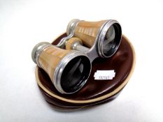 A set of mother of pearl opera glasses by F Robson & Co of Newcastle