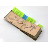 A small autograph album various signatures of 20th century stars, comedians,