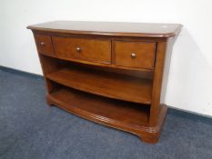 A Willis & Gambier set of bow-fronted bookshelves fitted three drawers
