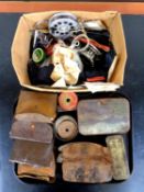 A box and a tray containing vintage fishing equipment to include spools, lures,