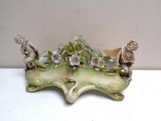 A Victorian cherub flower encrusted planter (a/f)