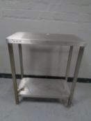 A stainless steel two tier prep table,