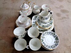 A tray containing a 9 piece Paragon Victoriana Rose tea for two together with a 21 piece Crown