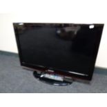 A Samsung 32'' TV with remote