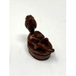 A carved hardwood Chinese netsuke - Erotic nude in wash tub