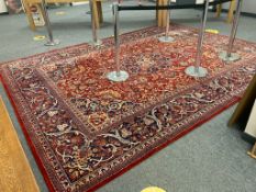 A machine made Persian design carpet,
