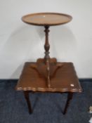 An Edwardian oak occasional table and a mahogany wine table
