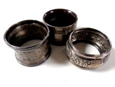 Three silver napkin rings (odd)