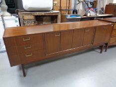 A mid 20th century teak G Plan low cocktail sideboard