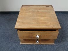 A pine clerk's writing slope fitted two drawers
