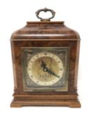 A walnut-cased mantel clock by Fattorini, height 23 cm.