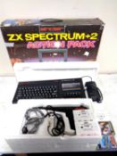 A Sinclair ZX Spectrum Plus 2 with light gun and games (in original box)