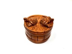 A carved hardwood Chinese netsuke - Two turtles in a barrel