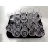 A tray containing lead crystal glassware to include high ball glasses, whiskey tumblers,