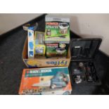 A box containing Black & Decker Scorpion saw, Draper grease gun, power sprayer,