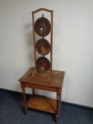 An Edwardian oak two tier occasional table together with a three tier oak cake stand