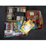 Three boxes containing assorted DVD's, cassette tapes, 7" singles, books to include,