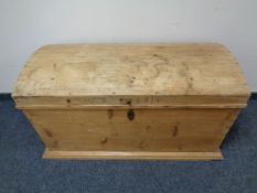 An antique pine dome topped trunk