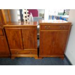 A Bradley Furniture reproduction yew wood television and audio cabinet (2)