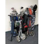 Four golf bags containing assorted irons and drivers to include Dunlop, Howson, Donnay etc,