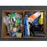 Two boxes containing tools, hardware, extension leads, battery charger,