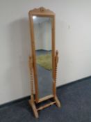 A stripped pine barley twist cheval mirror