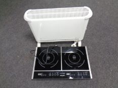 A Palson twin induction hob together with an electric heater