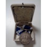 A WWII Long Service and Good Conduct medal