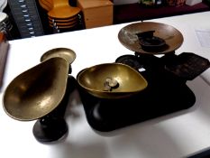 Three sets of antique kitchen scales with weights