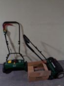 Three boxed Cooper's lawn aerators together with a Qualcast lawn mower and aerator (a/f)