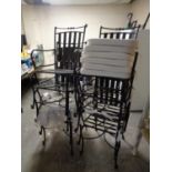 A set of six metal stacking garden armchairs with cushions