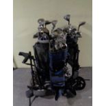 Two golf bags of a large quantity of drivers and irons to include Wilson, Dunlop, Killer Whale,