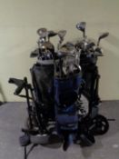 Two golf bags of a large quantity of drivers and irons to include Wilson, Dunlop, Killer Whale,