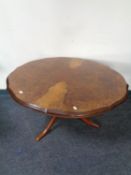 A burr walnut veneered shaped coffee table