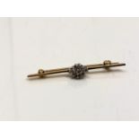 A 9ct gold diamond set bar brooch CONDITION REPORT: 2g