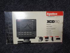 An Apelco XCD350 fish finder in box