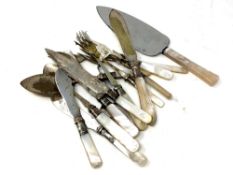 A quantity of cutlery, vintage slice,