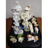 A tray of early 20th century and later figurines to include Leonardo