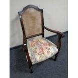 A 20th century beech bergere backed bedroom armchair