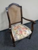 A 20th century beech bergere backed bedroom armchair