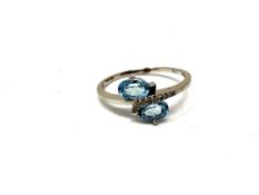 A 9ct gold diamond and aquamarine ring