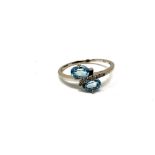 A 9ct gold diamond and aquamarine ring