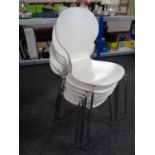 A set of six Julian Bowen kitchen stacking chairs on metal legs (white)