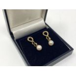 A pair of 9ct gold pearl drop earrings CONDITION REPORT: 3.