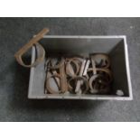 A box of a quantity of metal letters
