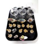 A tray containing a set of six etched champagne glasses, brass and crystal mice band figures,